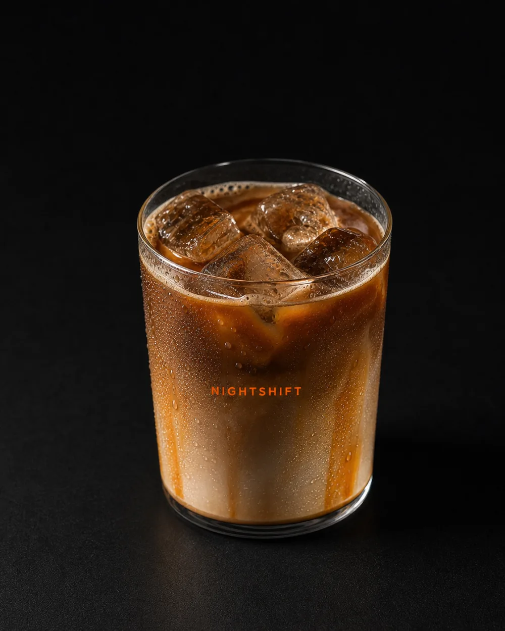 Iced Caramel Afterhours latte with espresso and milk layers
